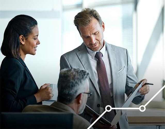 Corporate executives evaluating international bank guarantee solutions